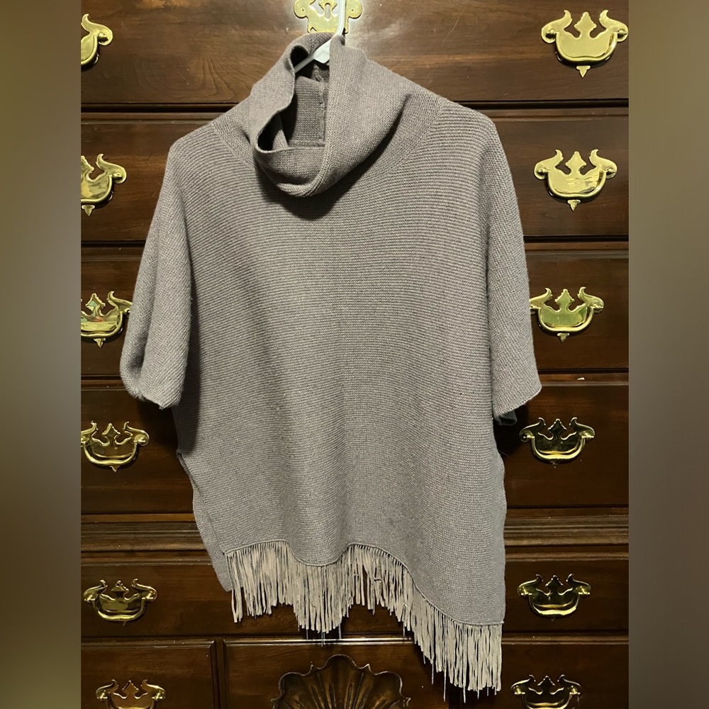 FABIANA FILIPPI
Purple wool, cashmere and silk poncho